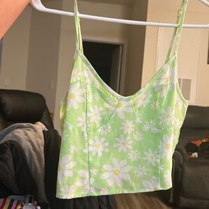 Green tank top daisy flowers, fits like a small